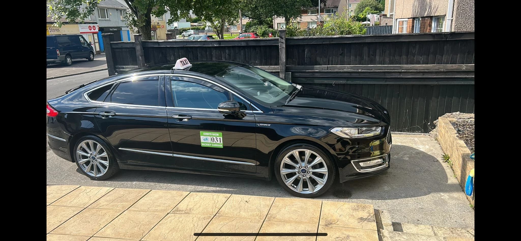 Central Cabs taxi parked in Neath